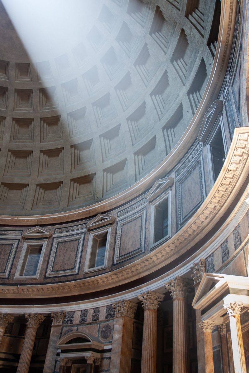 Inside dome of Pantheon with beam of light