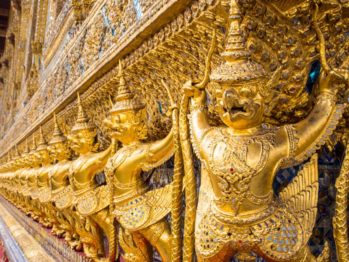 Gold figures on Thai temple