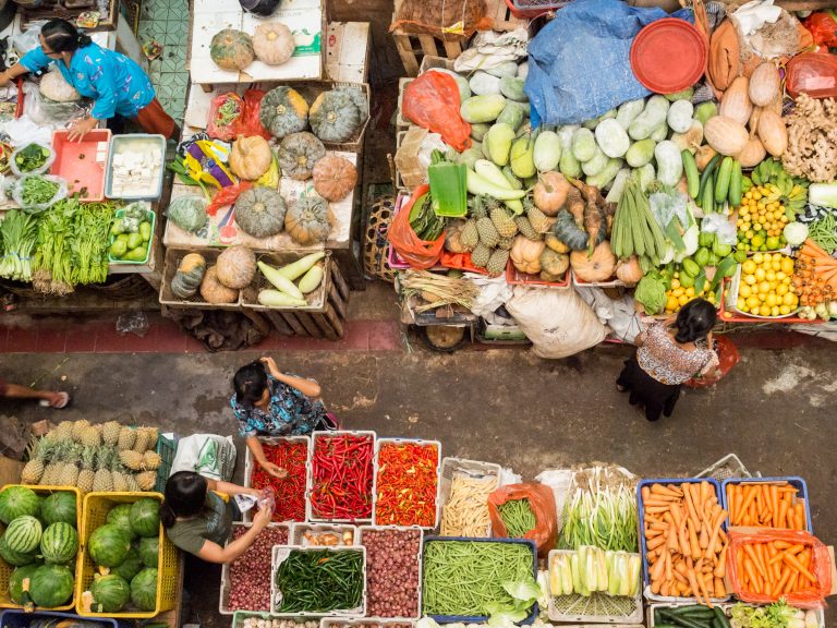 View looking down on women in vegetable market