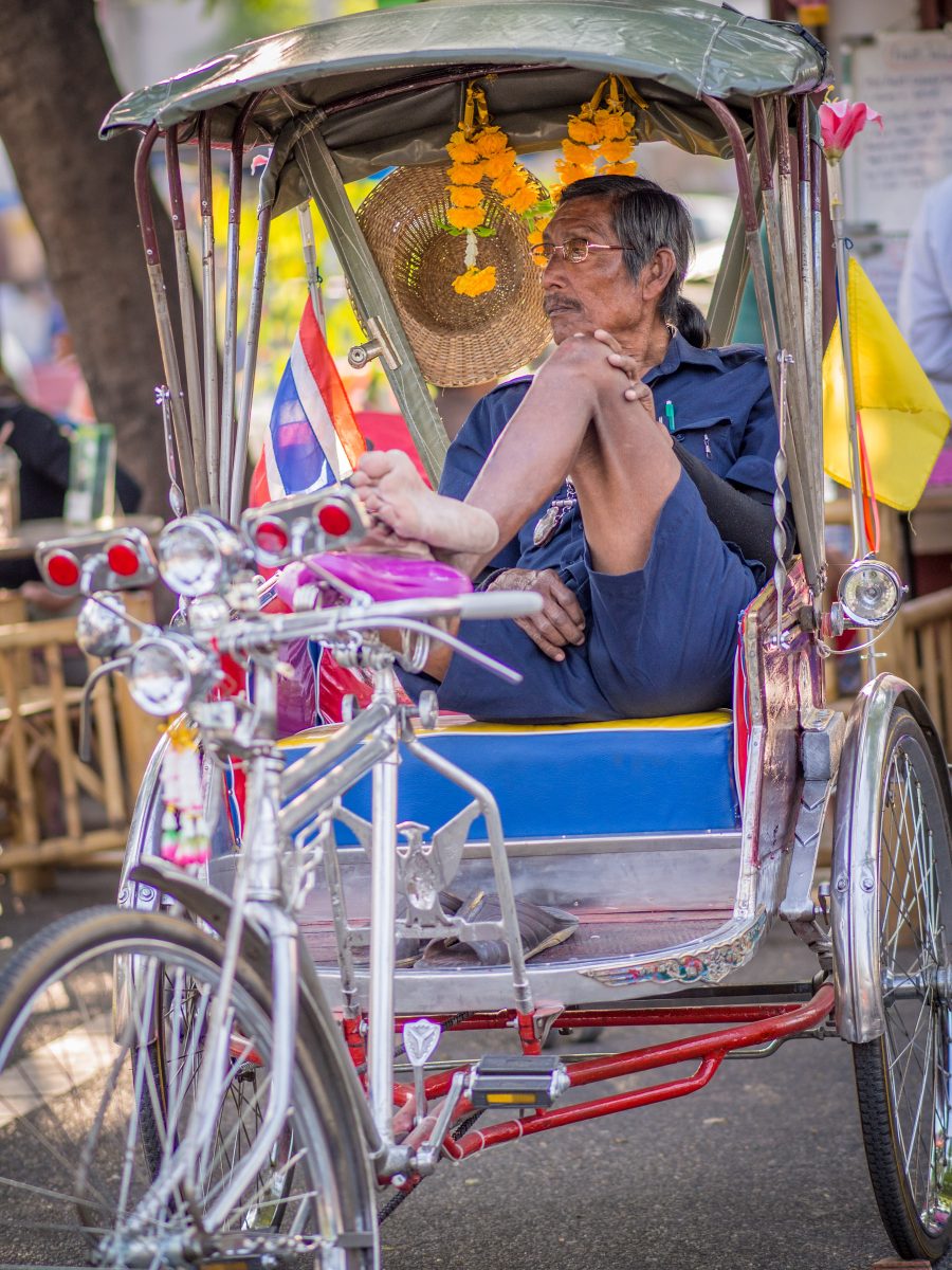 Rickshaw driver lounging