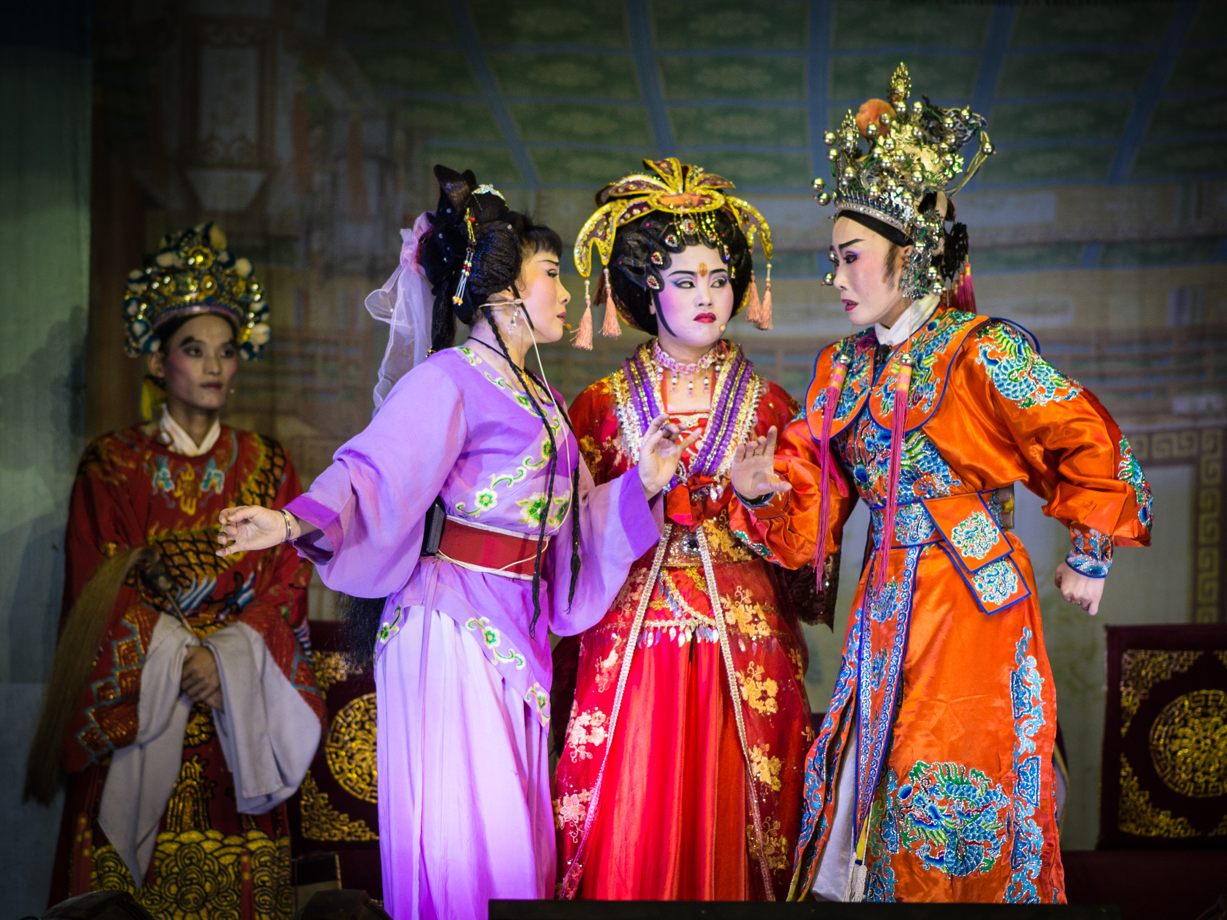 Chinese opera performers on stage in elaborate costumes