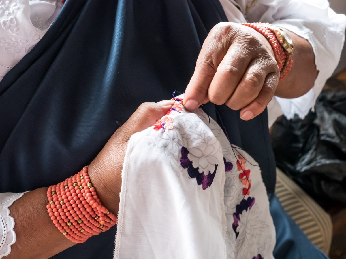 Woman's hands embroidering