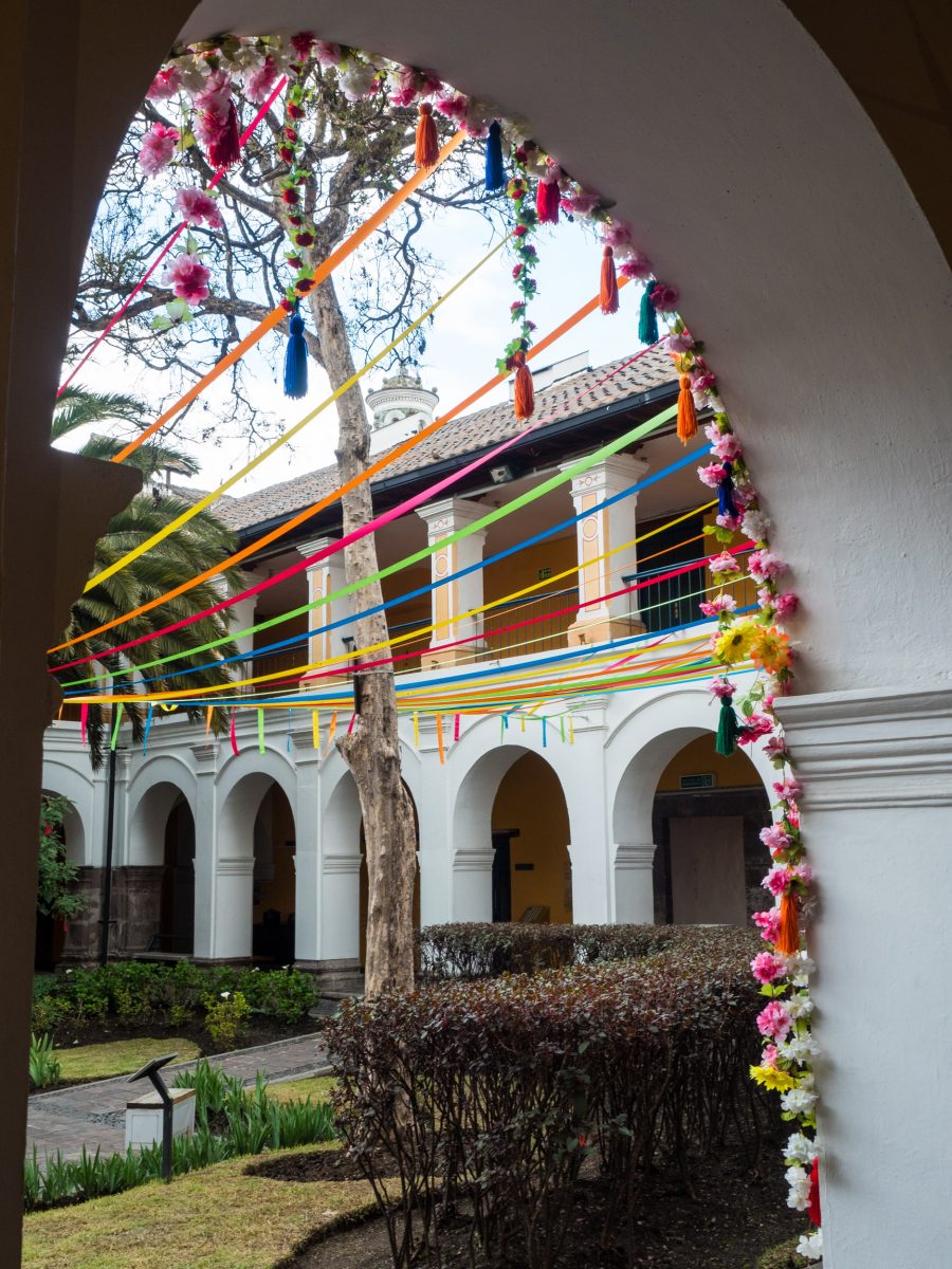 Courtyard doorway with flowers and ribbons