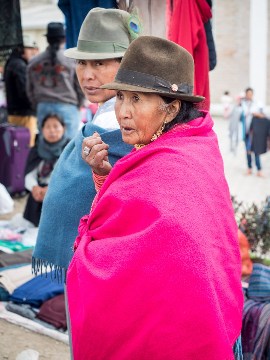 Indigenous women in ponchos